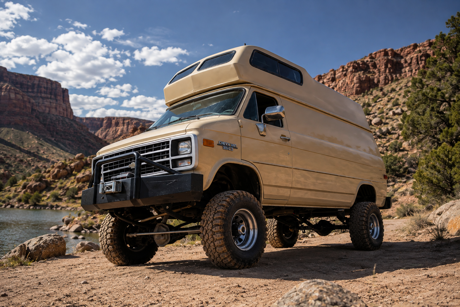 Lifted beige Chevrolet high-top 4x4 van in canyon terrain